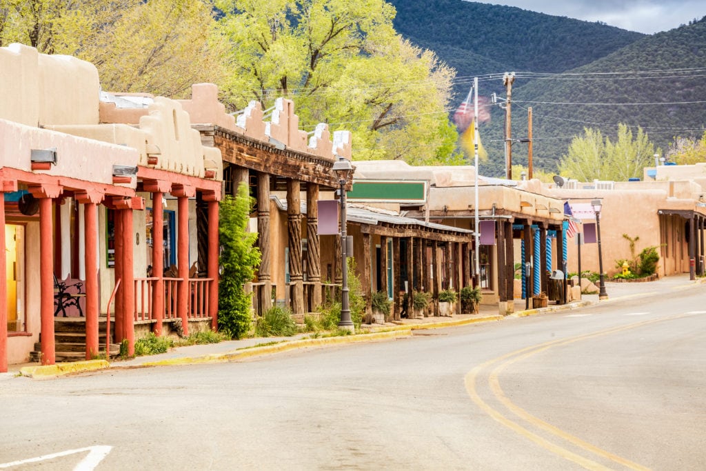 Buildings in Taos, which is the last stop before entering Taos Pueblo, New Mexico Buildings in Taos which is the last stop before entering Taos Pueblo New Mexico from Tumbleweed Travel