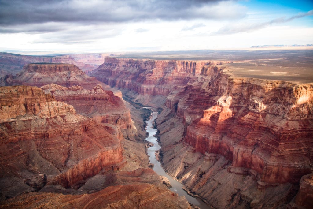 View over the south and north rim part in grand canyon from the helicopter, USA View over the south and north rim part in grand canyon from the helicopter USA from Tumbleweed Travel
