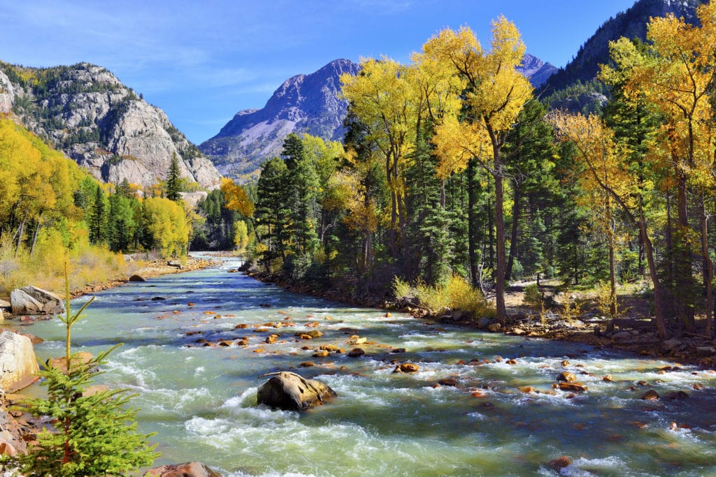 mountain river and colourful mountains of Colorado during foliage season mountain river and colourful mountains of Colorado during foliage season from Tumbleweed Travel
